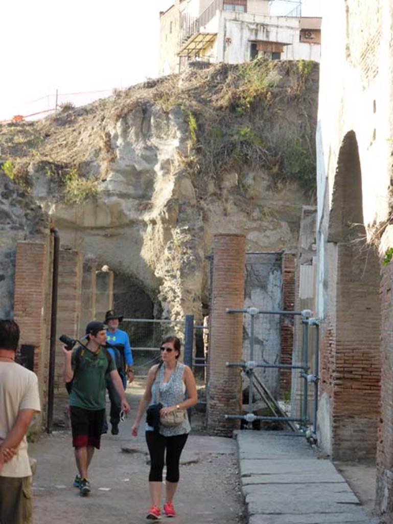 Herculaneum, September 2015. Looking west along the front of the Augusteum, also known as Basilica, from the arch on its east side. Looking west along line of arched portico, which would have joined the eastern arch to the western arch.