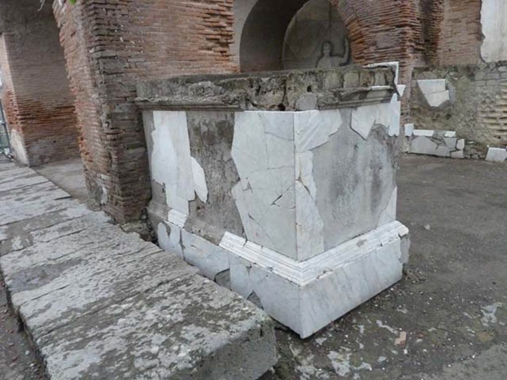 Herculaneum, September 2015. Looking west along front of second statue base on south-east side of four-sided arch.