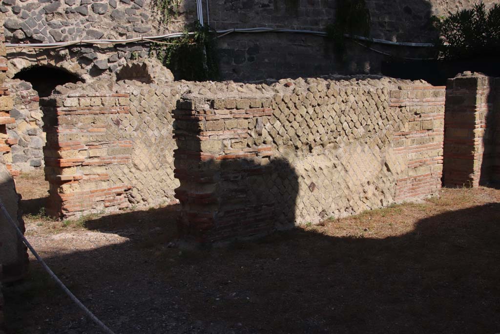 II.2 Herculaneum, September 2019. Looking towards west wall of exedra, at the north end (on right) was a doorway into a corridor/room. 
Photo courtesy of Klaus Heese.
