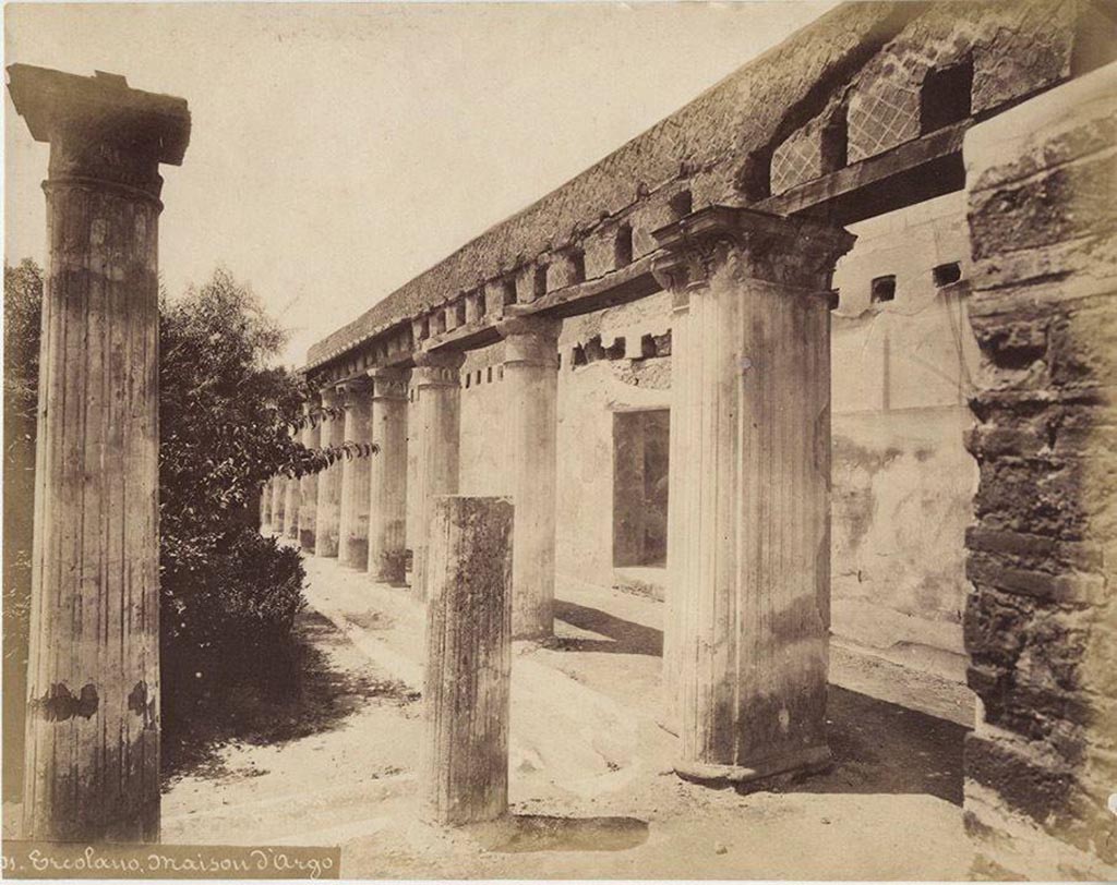 II.2 Herculaneum. Looking south along west portico of peristyle, from north portico.
Photograph n.x01, by Roberto Rive, (18..-1889).  Public domain, via Wikimedia Commons.
