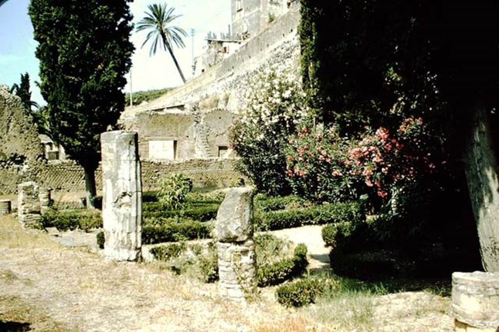 II.3 Herculaneum, 1957. Looking south-west across peristyle from the east portico. 
Photo by Stanley A. Jashemski.
Source: The Wilhelmina and Stanley A. Jashemski archive in the University of Maryland Library, Special Collections (See collection page) and made available under the Creative Commons Attribution-Non Commercial License v.4. See Licence and use details. J57f0434
