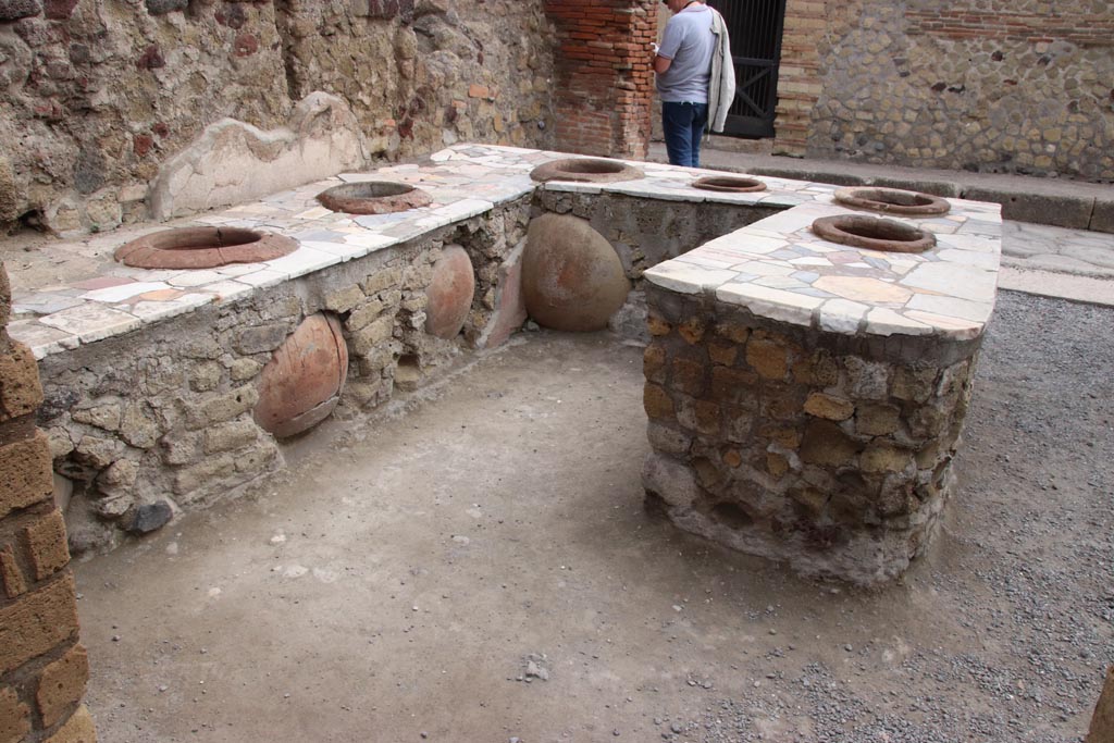 II.6/7 Herculaneum. May 2024. Looking north-west from rear of masonry counter/podium. Photo courtesy of Klaus Heese.