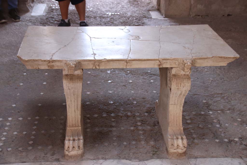 III.11 Herculaneum. September 2019. Room 6, looking east towards marble table near impluvium.
Photo courtesy of Klaus Heese. 
