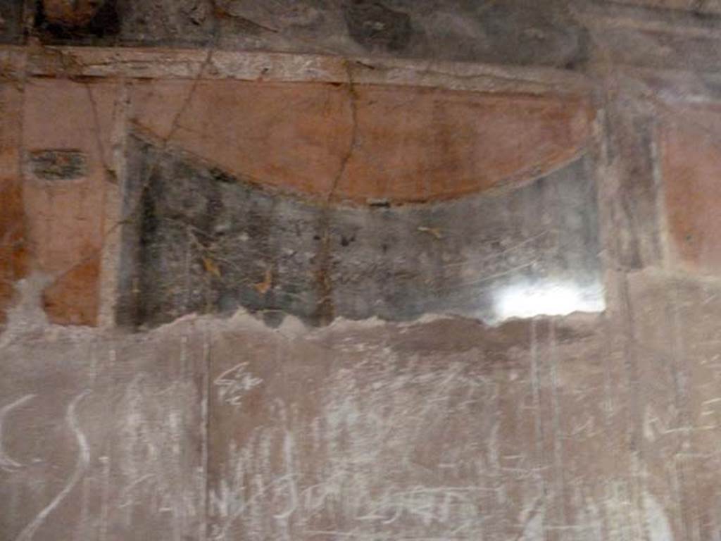 III.11 Herculaneum. May 2010. Room 8, detail from south wall. 