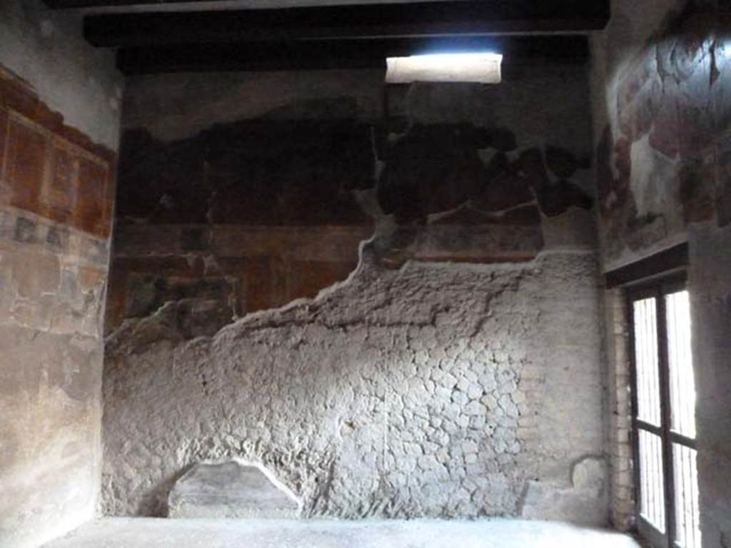 III.11 Herculaneum. May 2010. Room 8, west wall. 
