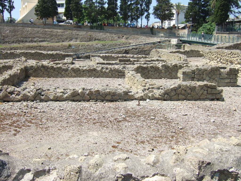 III, 19/18/1, Herculaneum, May 2006. Room 8, looking south across rooms on south side of atrium. 