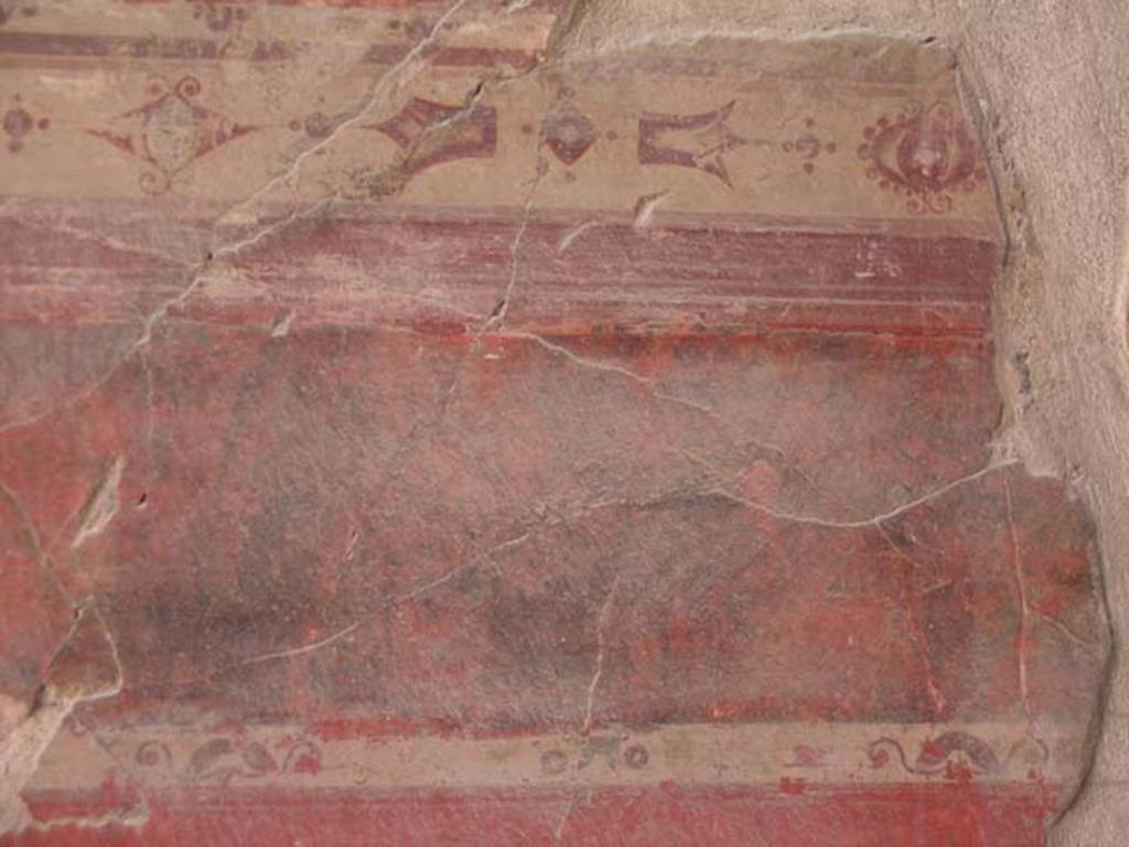 IV.15/16, Herculaneum, May 2005. Room 9, detail of south wall. Photo courtesy of Nicolas Monteix.

