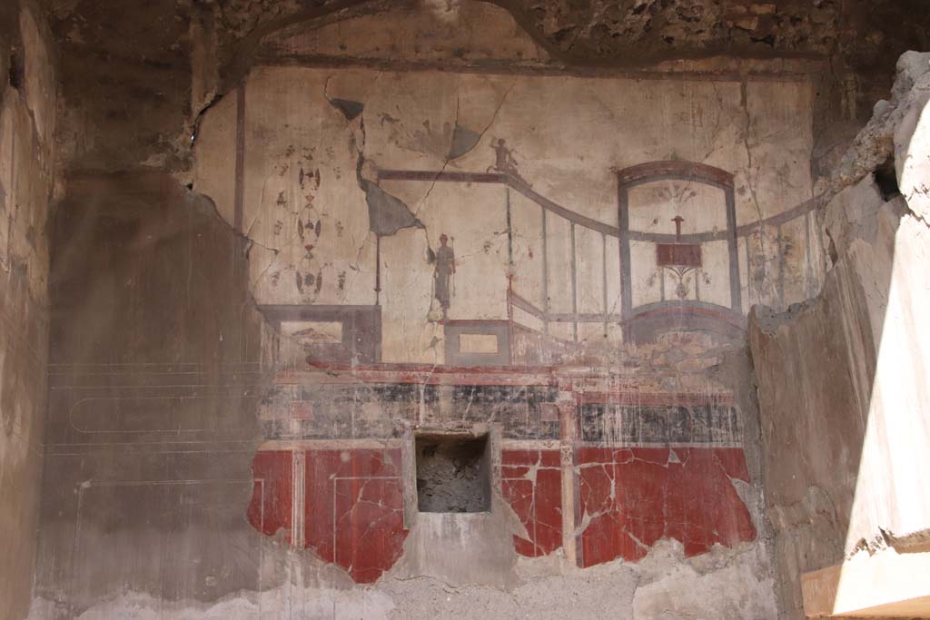 IV.15/16, Herculaneum, October 2020. Looking towards painted decoration on upper west wall of room 9. Photo courtesy of Klaus Heese. 