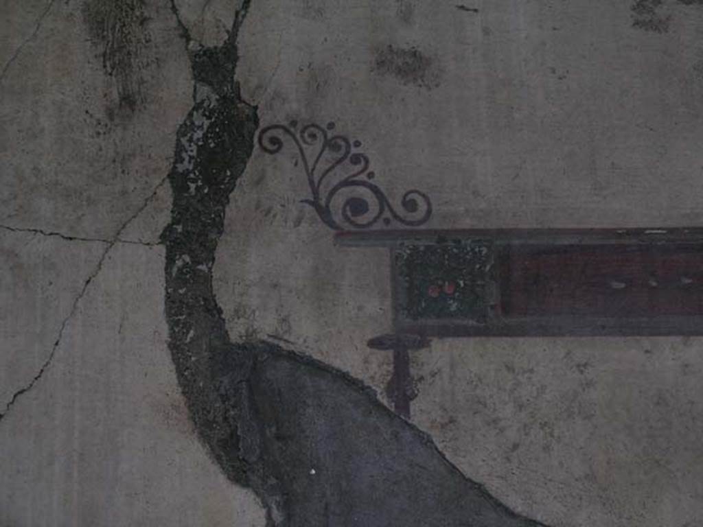 IV.15/16, Herculaneum, May 2005. Detail of painted decoration from south end of upper west wall of room 9.  Photo courtesy of Nicolas Monteix.

