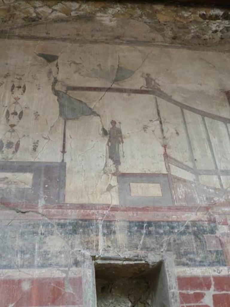 Ins. IV.15/16, Herculaneum, September 2015. Detail of painted figure from upper west wall.