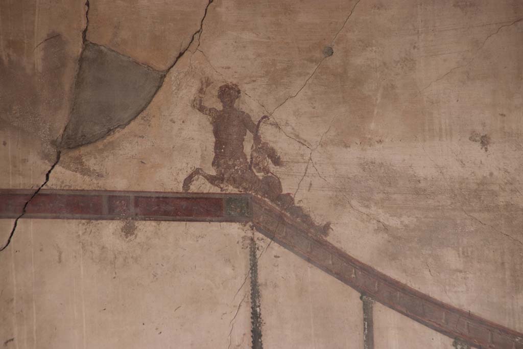 IV.15/16, Herculaneum, October 2020. Detail of painted figure of upper south end of west wall of room 9. Photo courtesy of Klaus Heese.