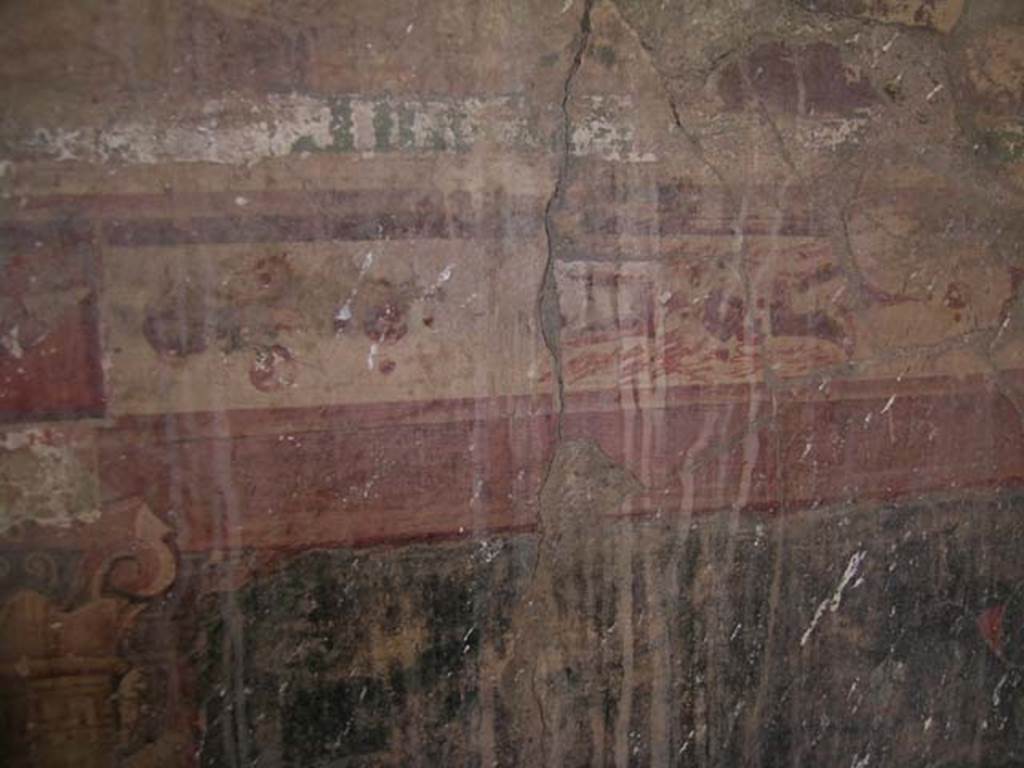 IV.15/16, Herculaneum, May 2005. Detail of painted decoration from west wall of room 9.
Photo courtesy of Nicolas Monteix.
