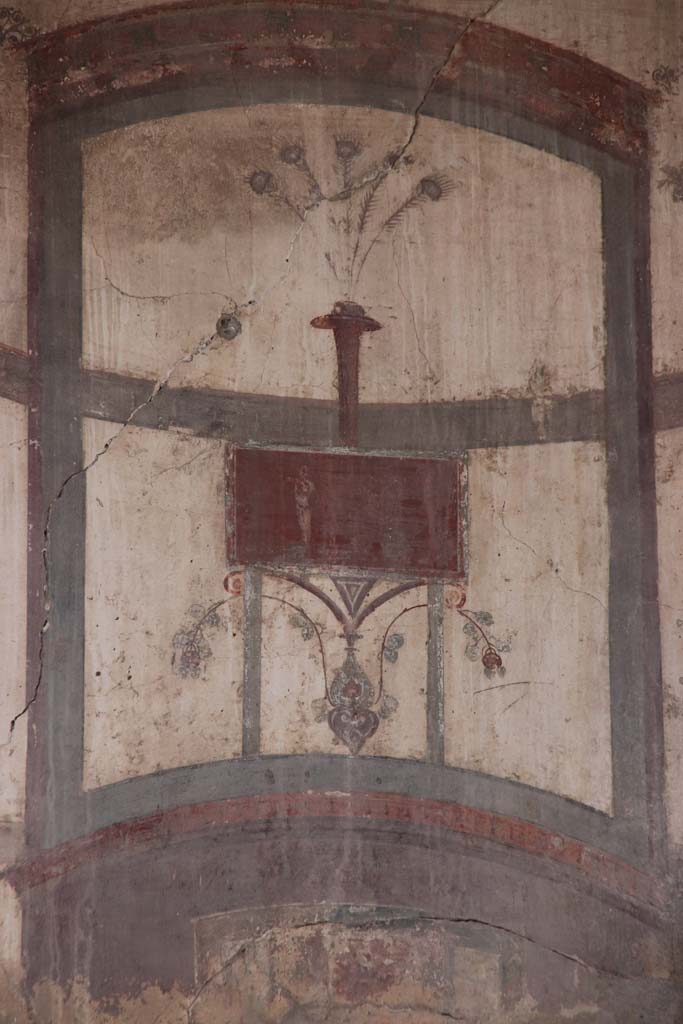 IV.15/16, Herculaneum, October 2020.  
Detail of painted decoration on north end of upper west wall of room 9. Photo courtesy of Klaus Heese. 
