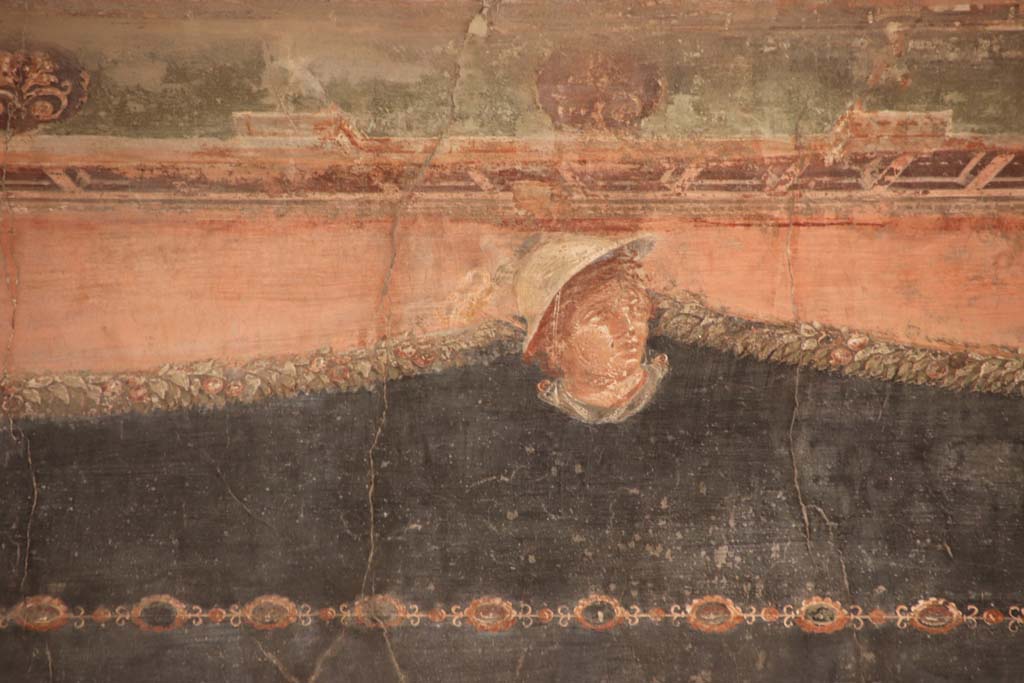 IV.21, Herculaneum. September 2019. Room 5, detail from upper centre of north wall. Photo courtesy of Klaus Heese.  

