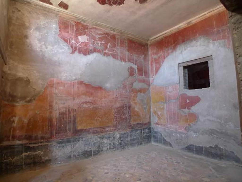IV.21, Herculaneum, June 2017, Room 7, looking towards north-west corner of oecus, with window in north wall to room 10.  Photo courtesy of Michael Binns.
