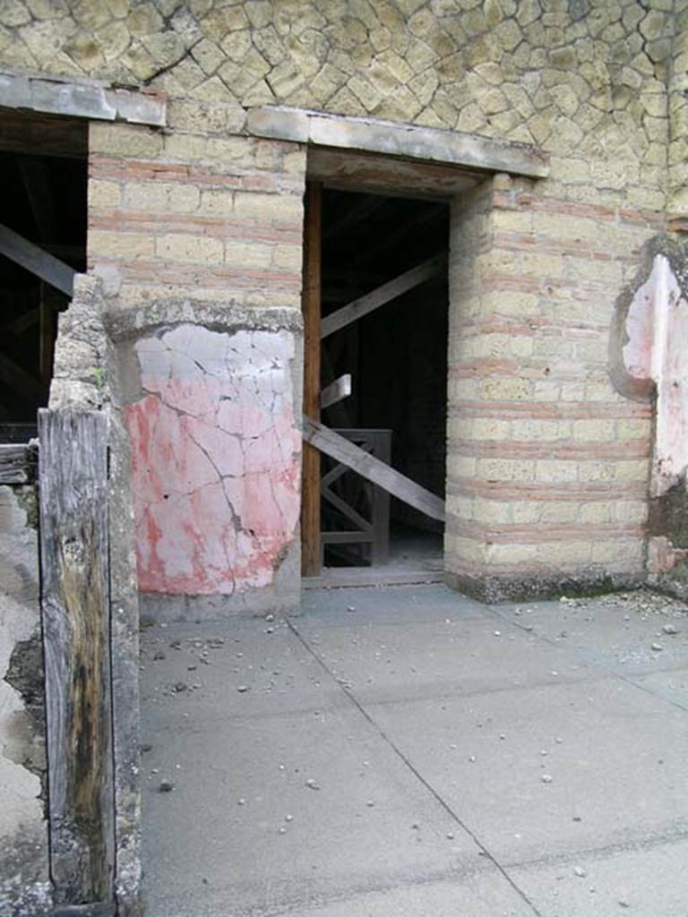 IV, 21, Herculaneum, May 2004. 
Looking west across upper floor towards a doorway leading onto the upper atrium balcony.
Photo courtesy of Nicolas Monteix.
