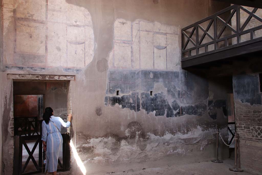 IV.21, Herculaneum. September 2019. Looking towards west wall of atrium, room 24. Photo courtesy of Klaus Heese.