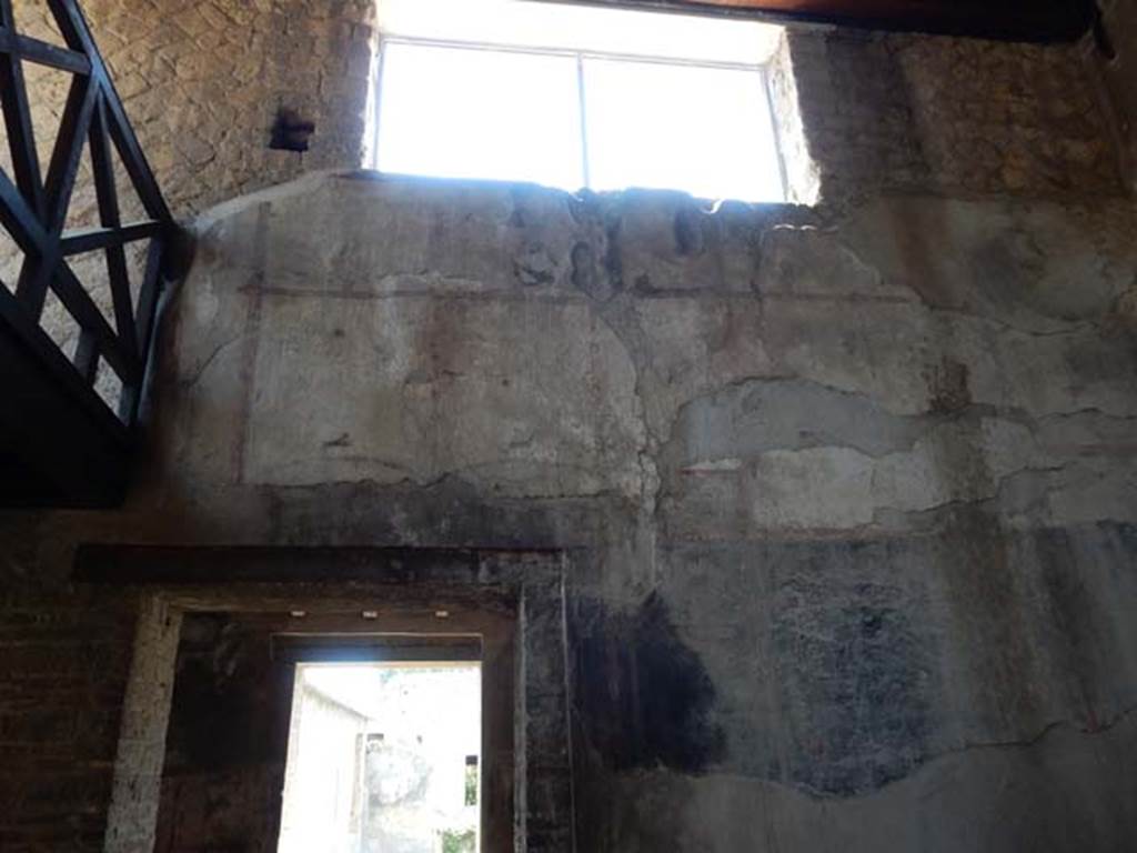 IV.21, Herculaneum. May 2018. Room 24, upper south wall of atrium. Photo courtesy of Buzz Ferebee. 