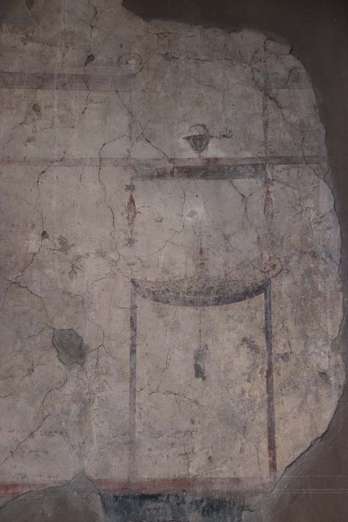 IV.21, Herculaneum. October 2020. 
Room 24, painted decoration from upper west wall above doorway to room 5, in atrium. 
Photo courtesy of Klaus Heese.
