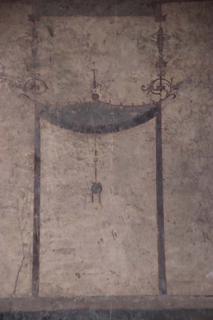 IV.21, Herculaneum. October 2020. 
Room 24, detail of painted decoration from north end of upper west wall in atrium. Photo courtesy of Klaus Heese.  
