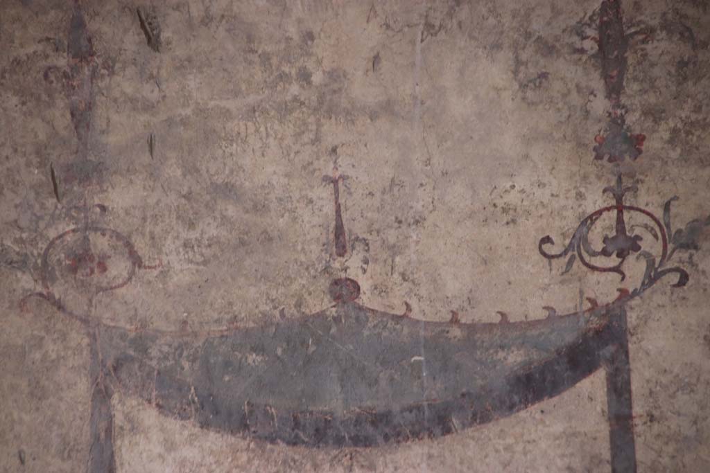 IV.21, Herculaneum. October 2020. Room 24, painted decoration from north end of upper west wall in atrium. Photo courtesy of Klaus Heese.  