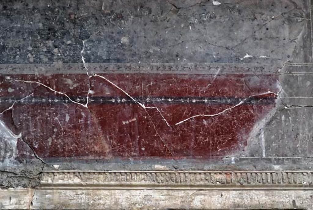 V.1, Herculaneum, November 2008. Atrium, painted decoration from south end of upper west wall. Photo courtesy of Nicolas Monteix.
