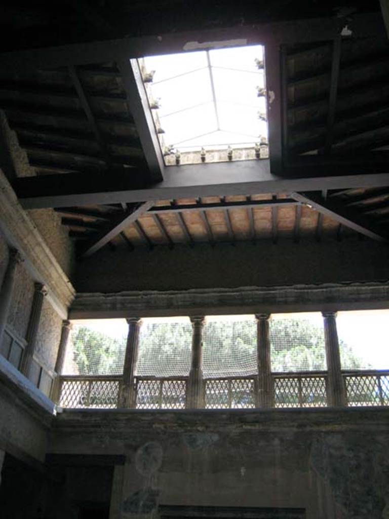 V.1 Herculaneum. June 2011. 
East side of atrium, with open inter-columnar spaces to light and give air to the atrium and compluvium above.
Photo courtesy of sera Baker. 

