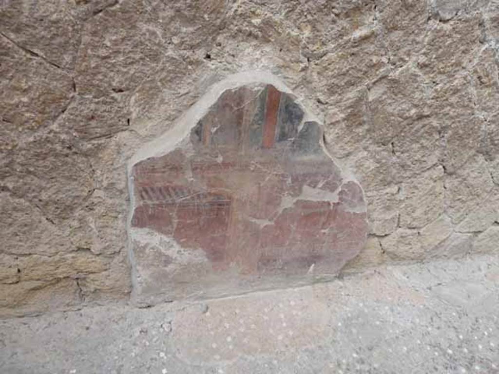 V.1 Herculaneum. May 2010. Painted decoration from south wall, see photo above, on right. 