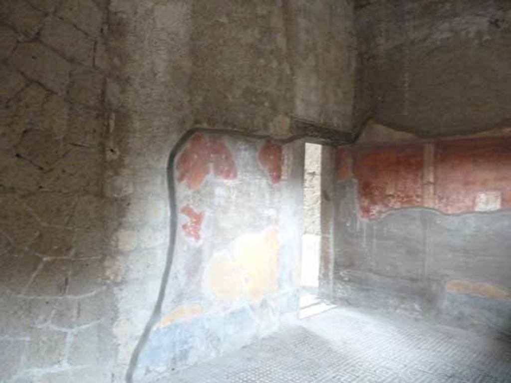 V.1 Herculaneum. May 2010. Room 2, looking towards south-east corner, and doorway to atrium.