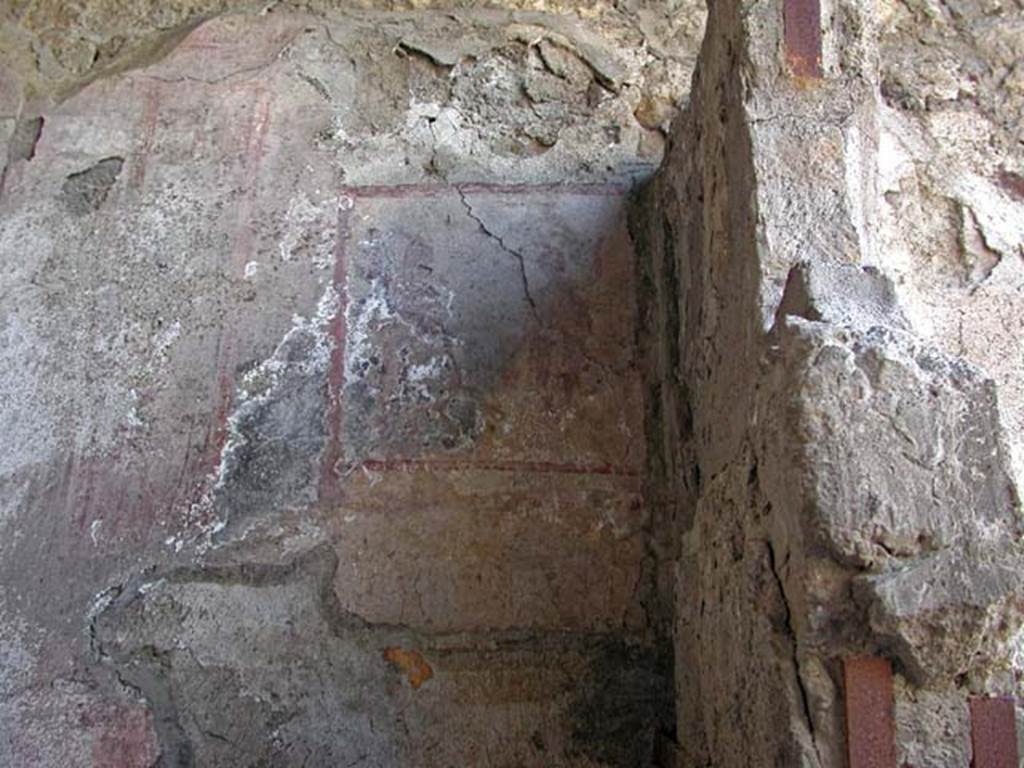 V.7/6, Herculaneum. September 2003. Upper room e, looking towards south wall in south-west corner. Photo courtesy of Nicolas Monteix.
