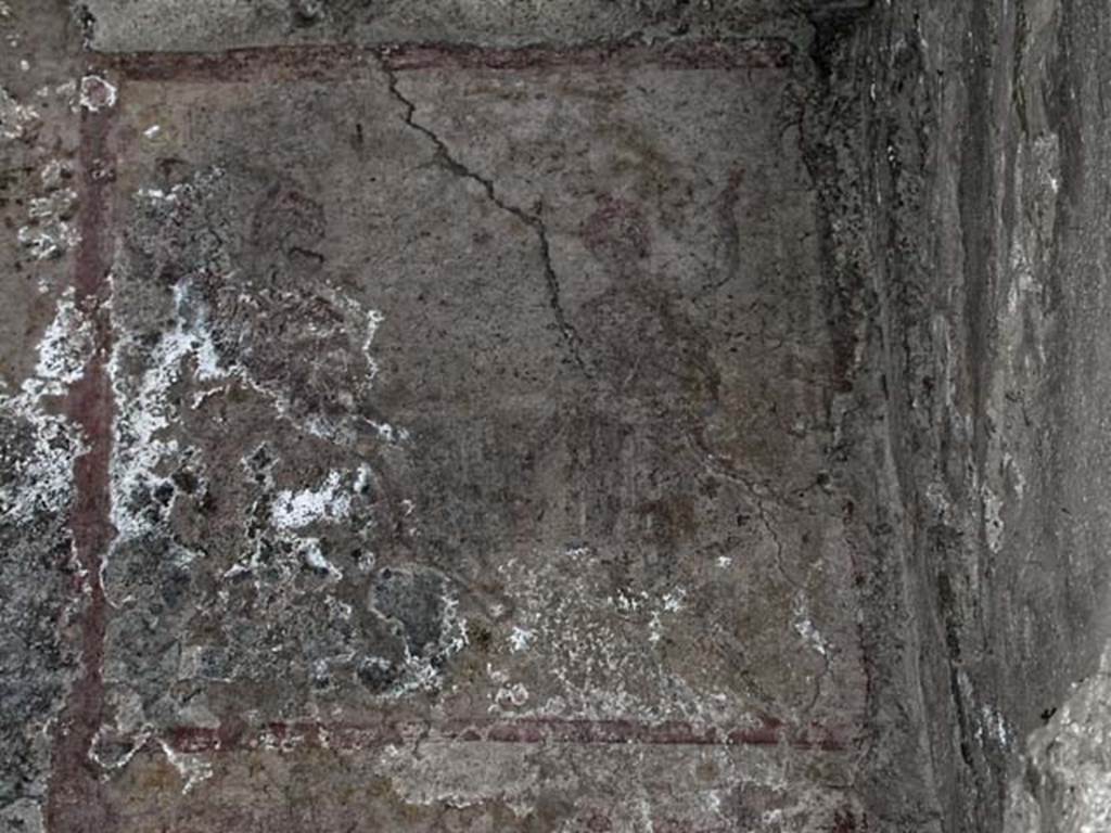 V.7/6, Herculaneum. September 2003. Upper room e, detail from south-west corner. 
Photo courtesy of Nicolas Monteix.
