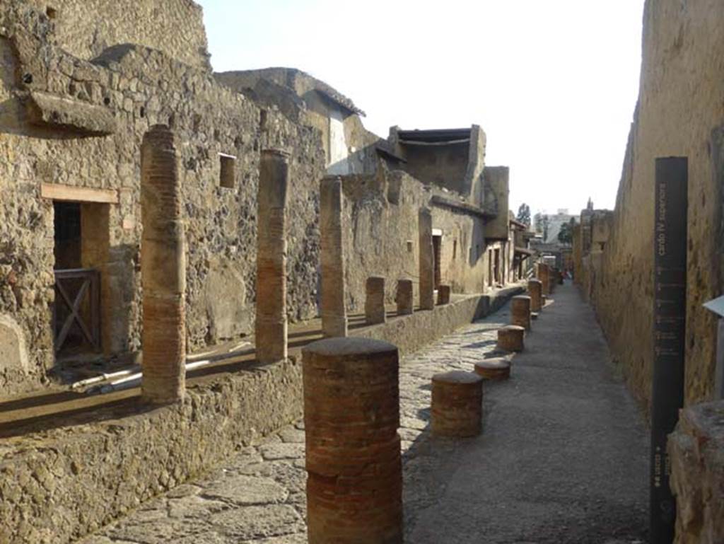 V, Herculaneum, September 2015. Doorway at V.9, on the left. 
Looking south along Cardo IV Superiore, from junction with Decumanus Maximus. 
