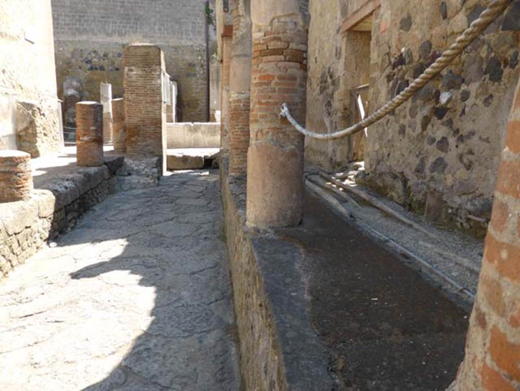 V.9 Herculaneum, on right. June 2014. North end of Cardo IV Superiore, looking north towards Decumanus Maximus.  Photo courtesy of Michael Binns.
