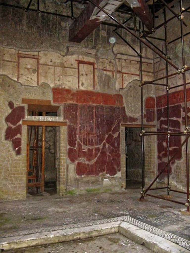 V.15, Herculaneum. May 2003. Looking towards north-west corner of atrium, and doorway to a cubiculum.
The doorway on the left, in the centre of the west wall, is also a cubiculum.
Photo courtesy of Nicolas Monteix.

