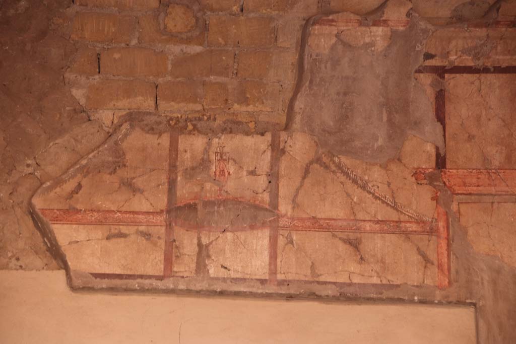 V.15 Herculaneum, October 2020. Detail of painted panel from upper south wall of atrium, above doorway to tablinum. Photo courtesy of Klaus Heese.