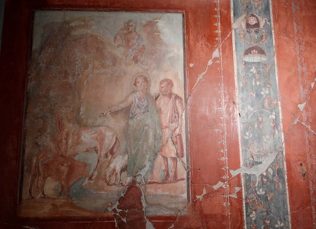 V.15 Herculaneum. October 2019. West wall of tablinum, with central painting of Daedalus and Pasiphae. 
Photograph  Parco Archeologico di Pompei.