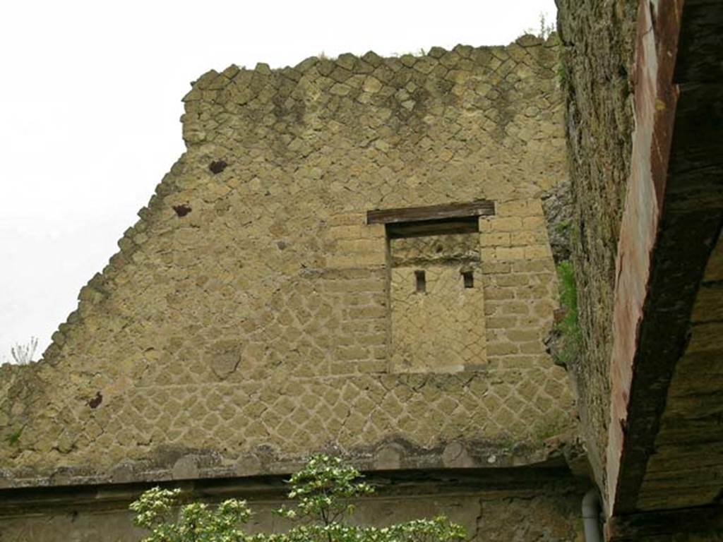 V.15, Herculaneum. May 2005. Upper west wall of portico/garden area.
Looking through window towards west wall of room of the so-called cross.
Photo courtesy of Nicolas Monteix.
