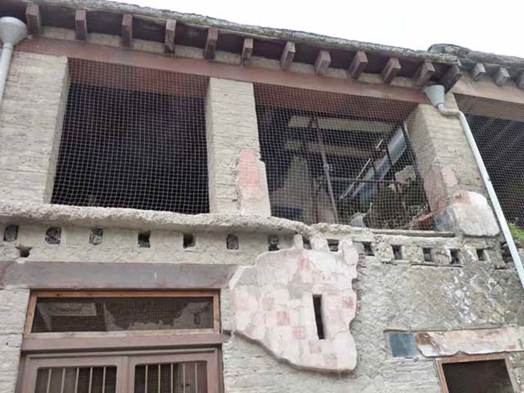 Ins. V 15, Herculaneum, May 2010. Upper floor of House of Bicentenary. The window above the doorway (no.14 on the right of the photo) would have given light into a room in which 150 waxed tablets of Calatoria Themis widow of C. Petronius Stephanus were found in a carbonized wooden box. The contents of the tablets were still readable and recorded the process of “ingenuitas” of Petronius Iusta, a girl born of Petronia Vitalis, a slave who was then freed by Petronius Stephanus.
