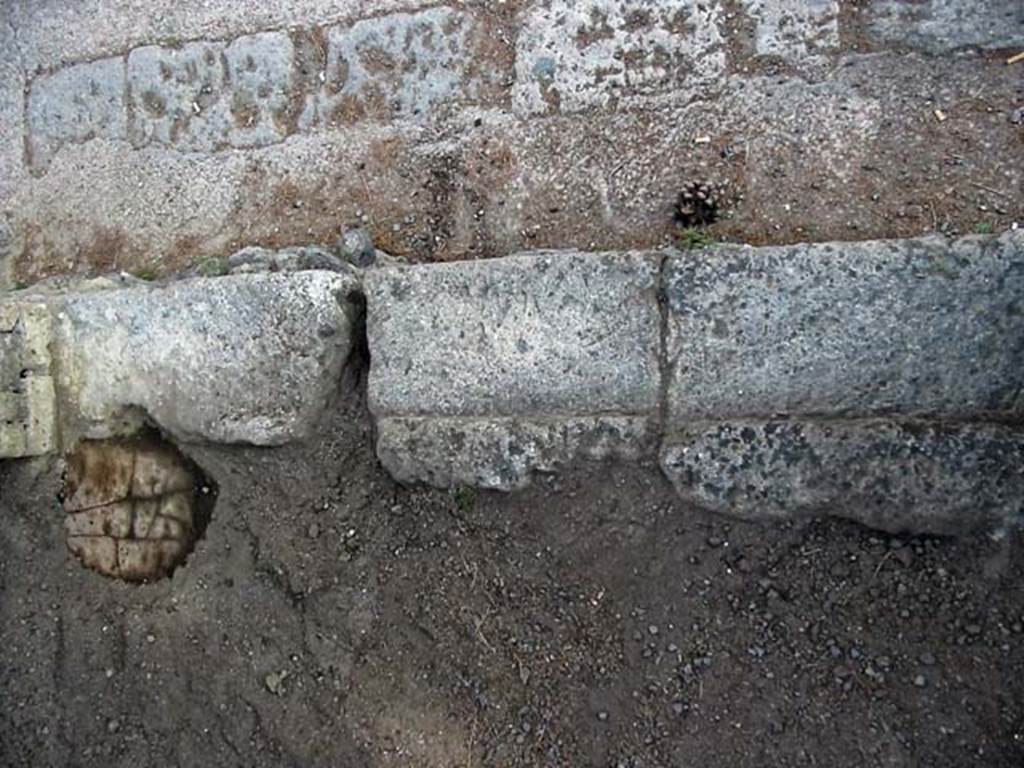 V.32 Herculaneum. May 2003. Threshold or sill of entrance doorway, looking east. Photo courtesy of Nicolas Monteix.