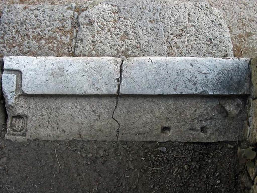V.33, Herculaneum. May 2003. Threshold of entrance doorway, at south end. Photo courtesy of Nicolas Monteix.