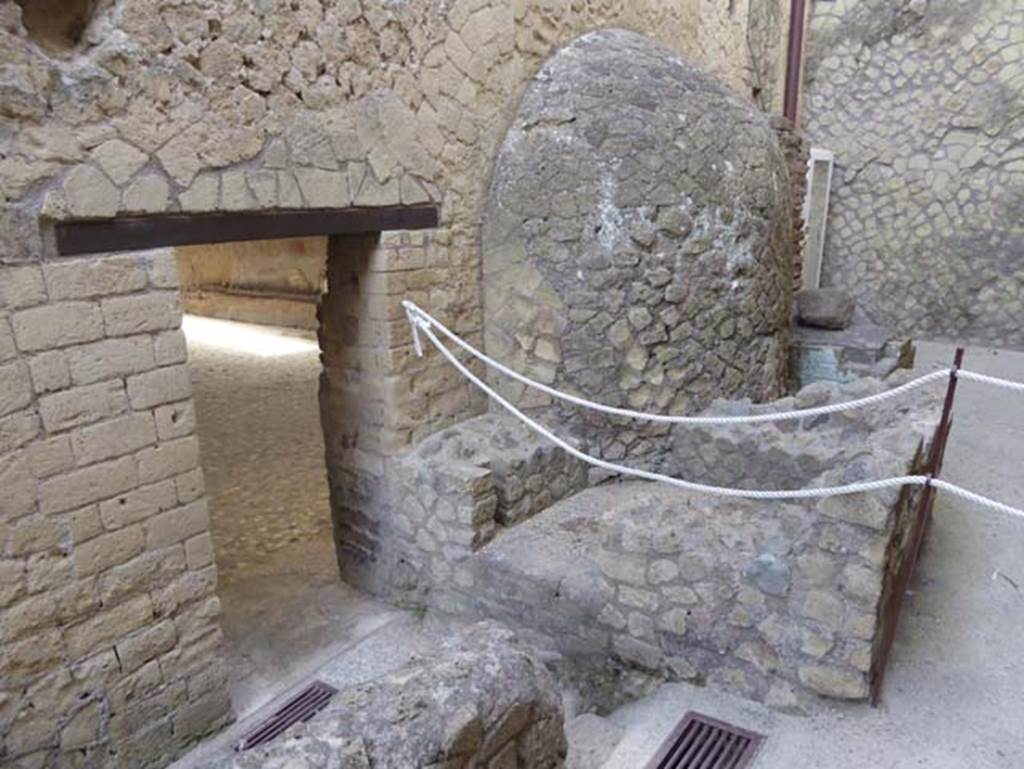 VI.10 Herculaneum, October 2014. Doorway at end of service corridor, leading into apodyterium of men’s baths, see VI.1/7. 
Looking towards the west end of the service corridor. Photo courtesy of Michael Binns.
In the centre-right of the photo is the small latrine in service corridor, possibly for the use of the workers.
See Camardo, D. & Notomista, M. Indagine archeologica nel corridoio di servizio (amb.14) delle Terme Centrale di Ercolano,
in Rivista di Studi Pompeiani, XXI, 2010, (p.151)

