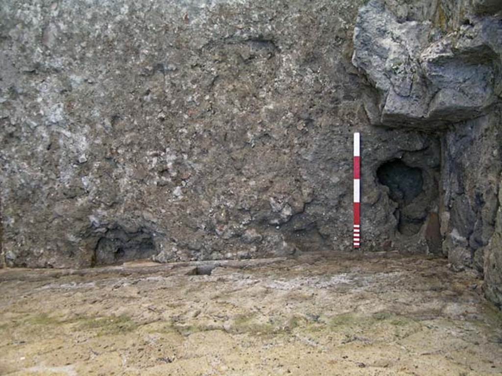 VI.12, Herculaneum. September 2004. Looking down in north-east corner of rear room. 
Photo courtesy of Nicolas Monteix.
