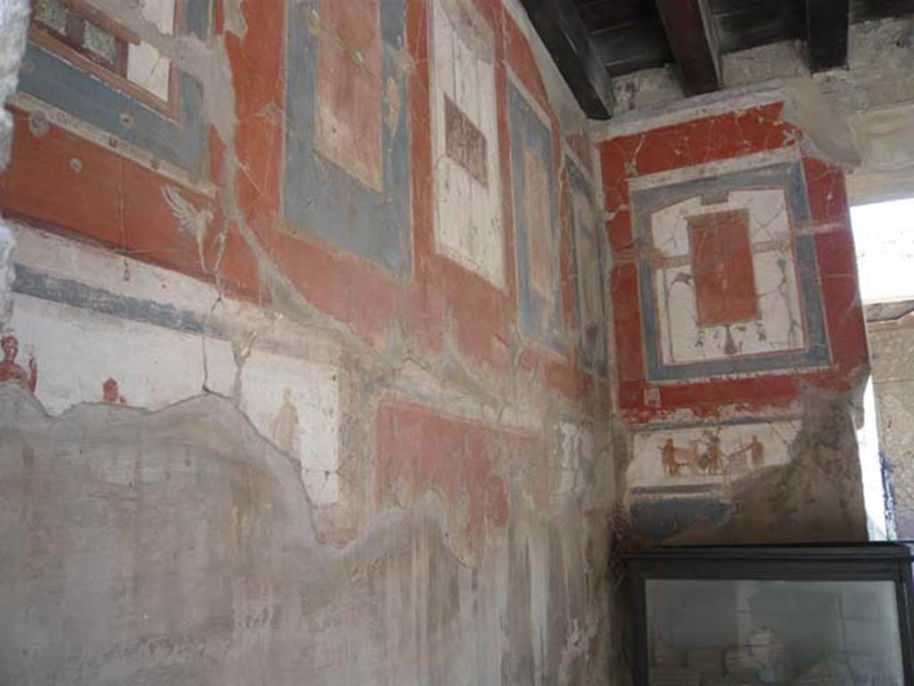 VI.16 Herculaneum. August 2013. Looking along east wall towards south-east corner of shop. Photo courtesy of Buzz Ferebee.
