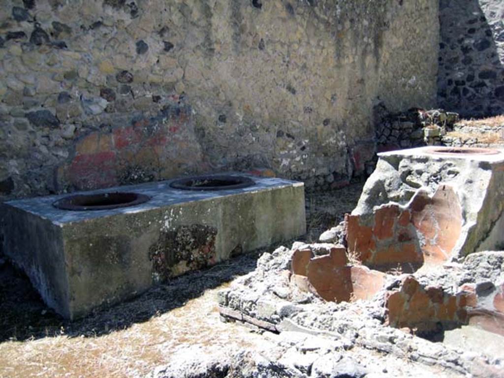 VI.19, Herculaneum, June 2011. Looking towards podium near east wall. Photo courtesy of Sera Baker.