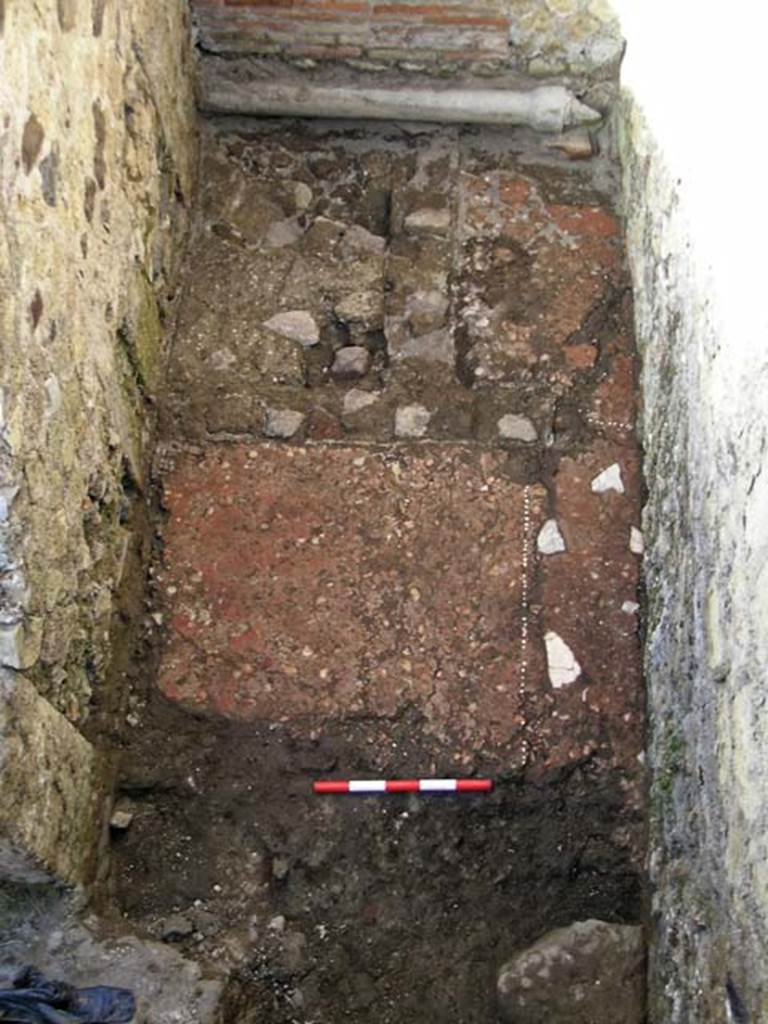 VI.25, Herculaneum. May 2004. Looking north in rear room.  
The doorway to the front shop-room is on the lower left. Photo courtesy of Nicolas Monteix.

