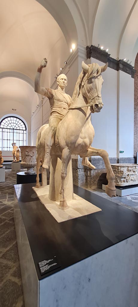 Herculaneum, public area. April 2023.
White marble equestrian statue of Marcus Nonius Balbus, inv. 6211.
Photo courtesy of Giuseppe Ciaramella.
(For other photographs, see Herculaneum Theatre).