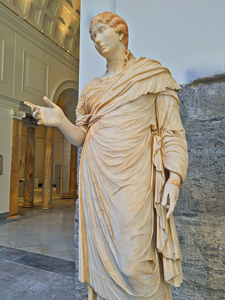 Herculaneum, public area. April 2023. Detail of white marble statue of a young woman.
On display in “Campania Romana” gallery of Naples Archaeological Museum, inv. 6248.
Photo courtesy of Giuseppe Ciaramella.