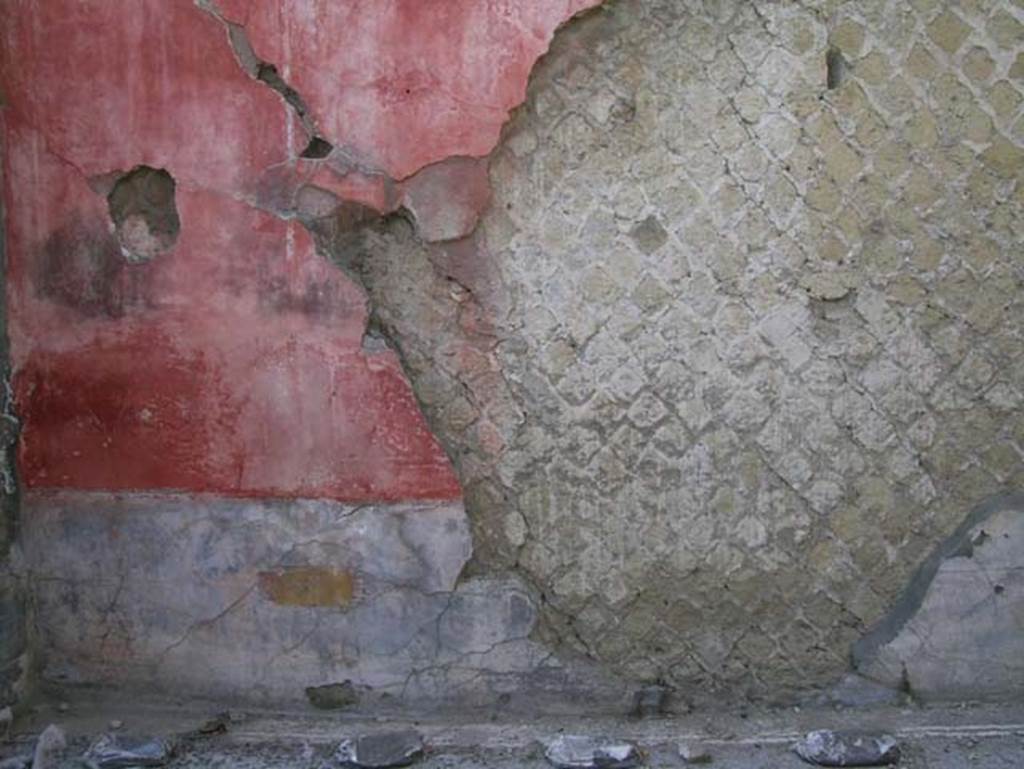 Ins. Orientalis II.4/19, Palaestra, Herculaneum, May 2006. Painted decoration remaining on wall of room at east end of upper loggia.
Photo courtesy of Nicolas Monteix.
According to Esposito, this is the west wall of room 13, of the said Palaestra.
Esposito, D. 2014. La pittura di Ercolano. Studi della SAP, 33. L’Erma di Bretschneider, (Tav 27, figs 5 & 6).
