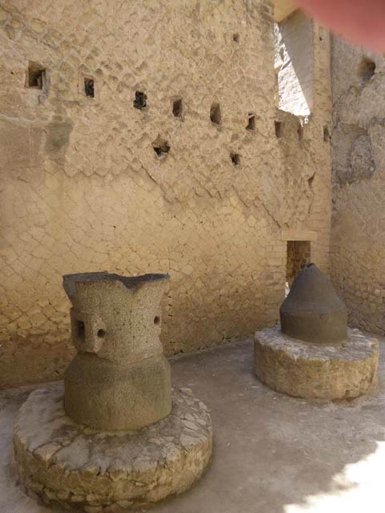 Ins. Or. II.8, Herculaneum, July 2015. Looking towards south wall and detail of mills in bakery. 
Photo courtesy of Michael Binns.
