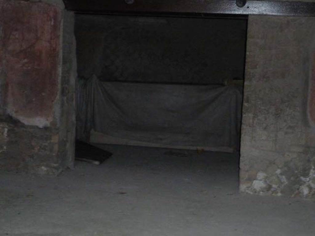Ins. Orientalis II.9, Herculaneum. September 2015. Looking towards doorway to rear room, in east wall. Against the east wall of this rear room was found a carbonised wooden bed.

